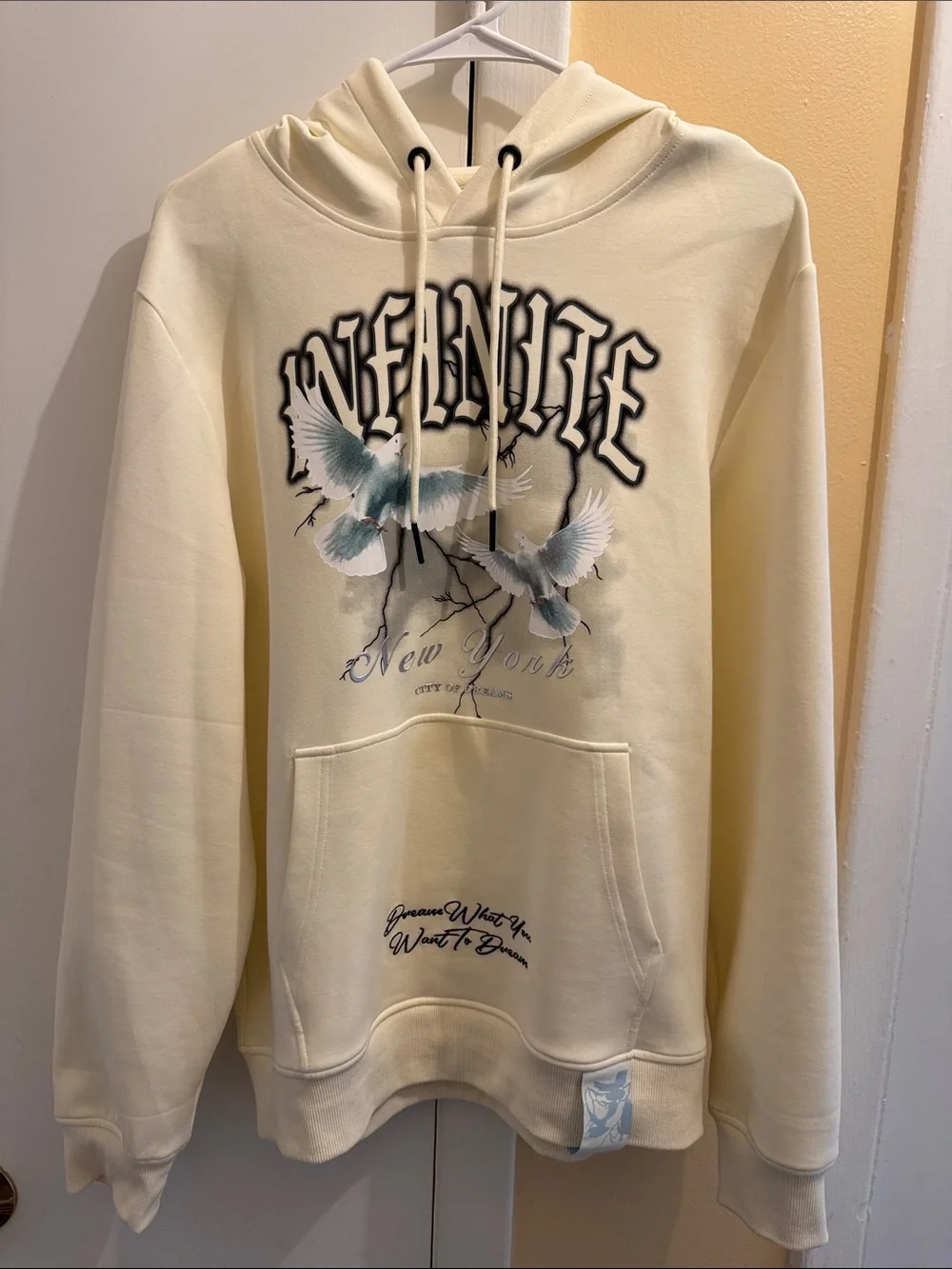 Cream Graphic Crewneck Hoodie with Dove Motif